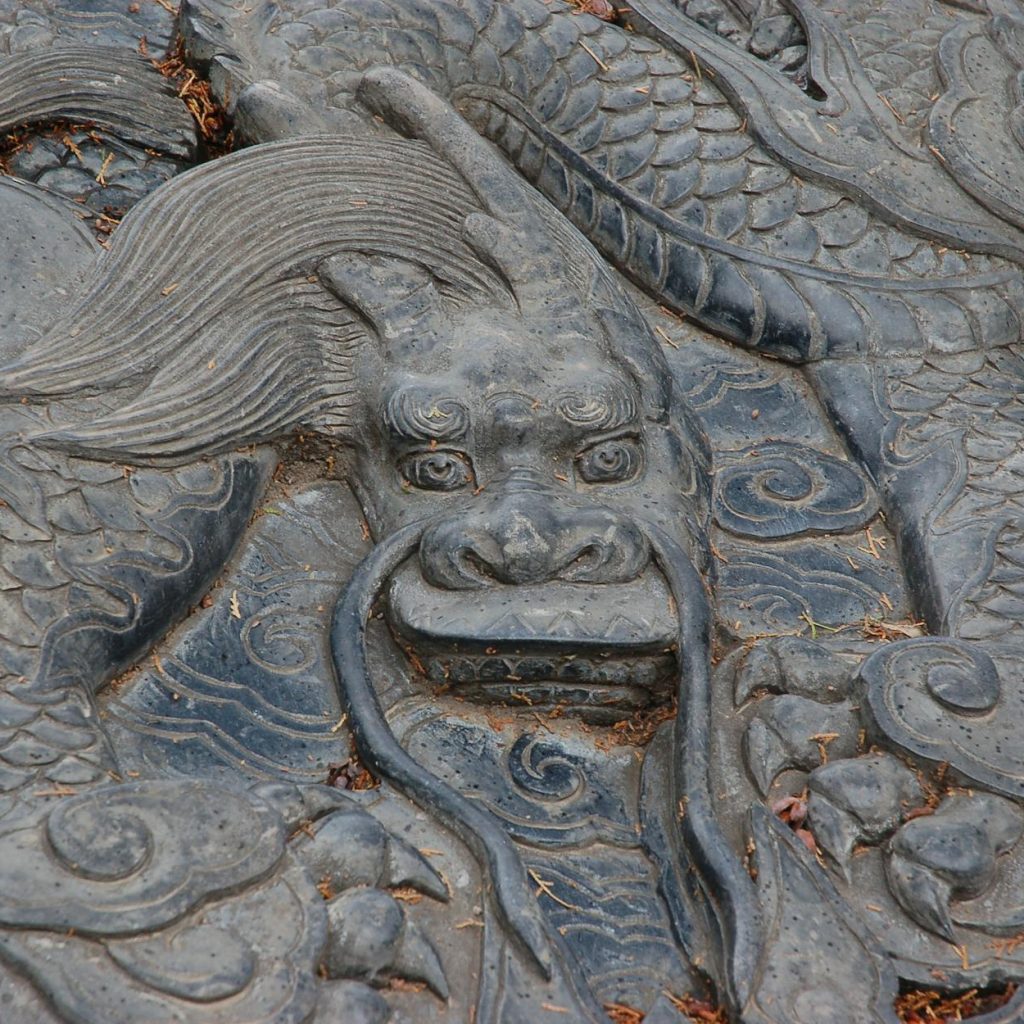 a sculpted dragon relief