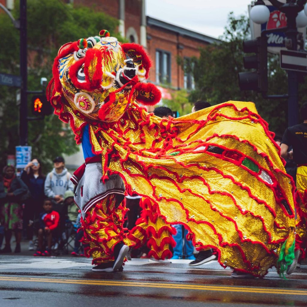 person wearing foo dog costume