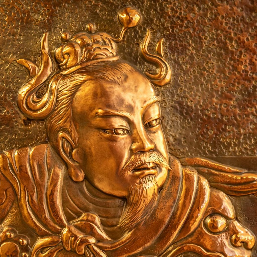 golden chinese emperor relief