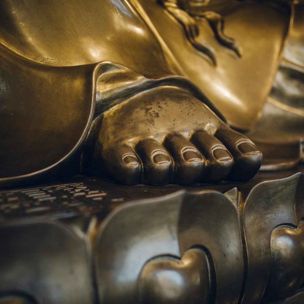 golden statue feet