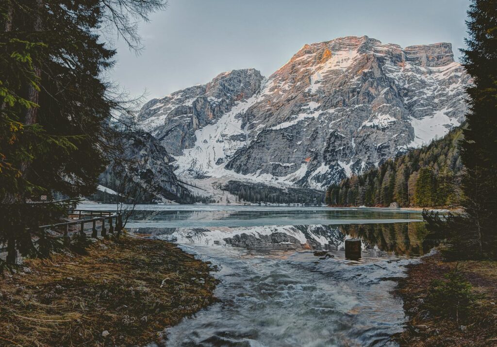 landscape photography of body water across mountain
